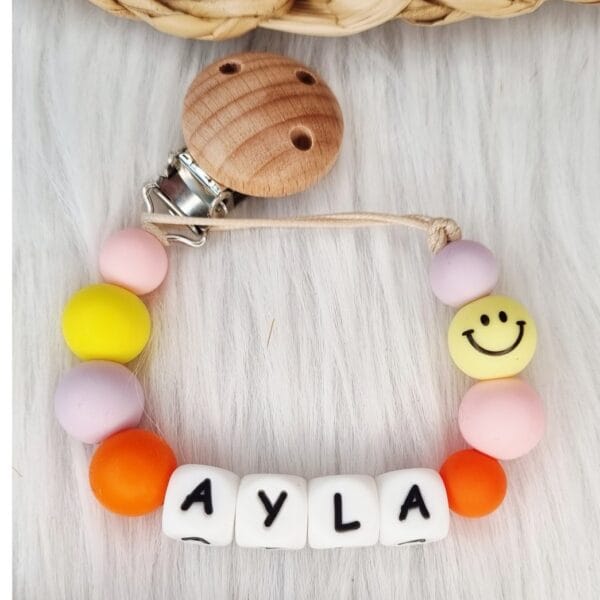 Speenkoord met naam Smiley babypink